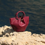 SAONARA. Mini Capazo Berry Piel